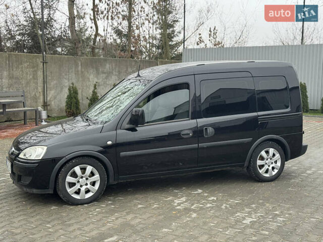 Черный Опель Комбо груз.-пасс., объемом двигателя 1.7 л и пробегом 219 тыс. км за 4999 $, фото 31 на Automoto.ua