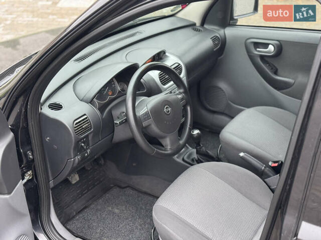 Черный Опель Комбо груз.-пасс., объемом двигателя 1.7 л и пробегом 219 тыс. км за 4999 $, фото 14 на Automoto.ua