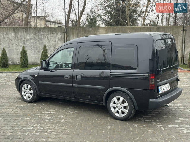 Черный Опель Комбо груз.-пасс., объемом двигателя 1.7 л и пробегом 219 тыс. км за 4999 $, фото 30 на Automoto.ua