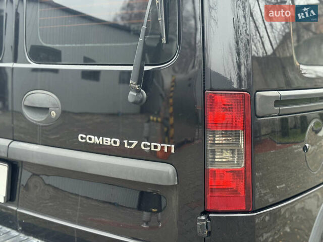 Черный Опель Комбо груз.-пасс., объемом двигателя 1.7 л и пробегом 219 тыс. км за 4999 $, фото 22 на Automoto.ua