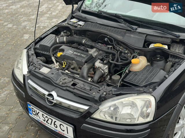 Черный Опель Комбо груз.-пасс., объемом двигателя 1.7 л и пробегом 219 тыс. км за 4999 $, фото 4 на Automoto.ua