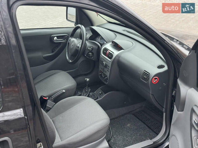 Черный Опель Комбо груз.-пасс., объемом двигателя 1.7 л и пробегом 219 тыс. км за 4999 $, фото 32 на Automoto.ua