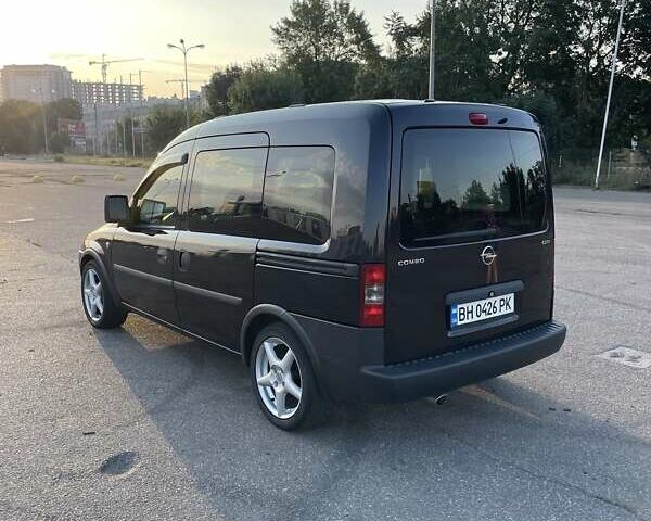 Черный Опель Комбо груз.-пасс., объемом двигателя 1.3 л и пробегом 177 тыс. км за 5600 $, фото 1 на Automoto.ua