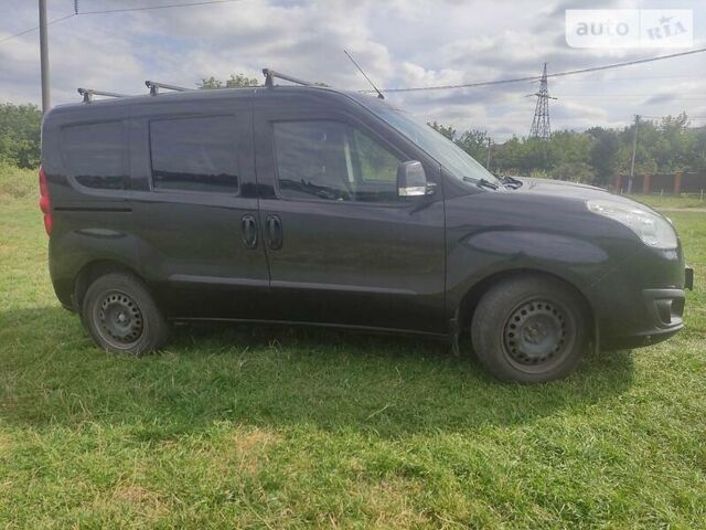Черный Опель Комбо груз.-пасс., объемом двигателя 1.4 л и пробегом 158 тыс. км за 6300 $, фото 7 на Automoto.ua