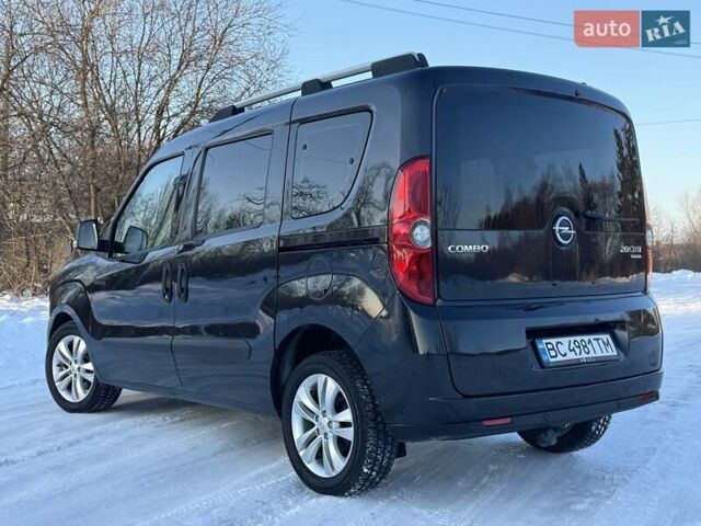 Чорний Опель Комбо вант.-пас., об'ємом двигуна 2 л та пробігом 179 тис. км за 9650 $, фото 19 на Automoto.ua