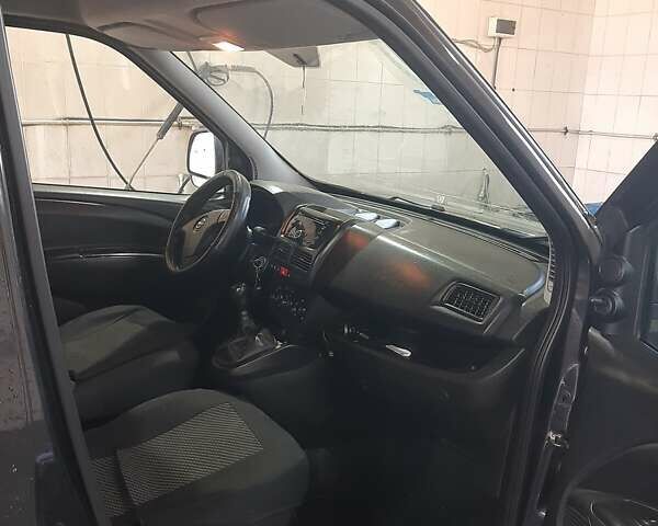 Черный Опель Комбо груз.-пасс., объемом двигателя 1.25 л и пробегом 316 тыс. км за 5000 $, фото 2 на Automoto.ua