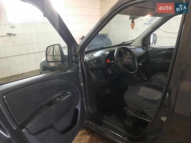 Черный Опель Комбо груз.-пасс., объемом двигателя 1.25 л и пробегом 316 тыс. км за 5000 $, фото 6 на Automoto.ua