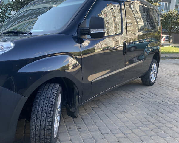 Черный Опель Комбо груз.-пасс., объемом двигателя 1.6 л и пробегом 288 тыс. км за 9499 $, фото 6 на Automoto.ua