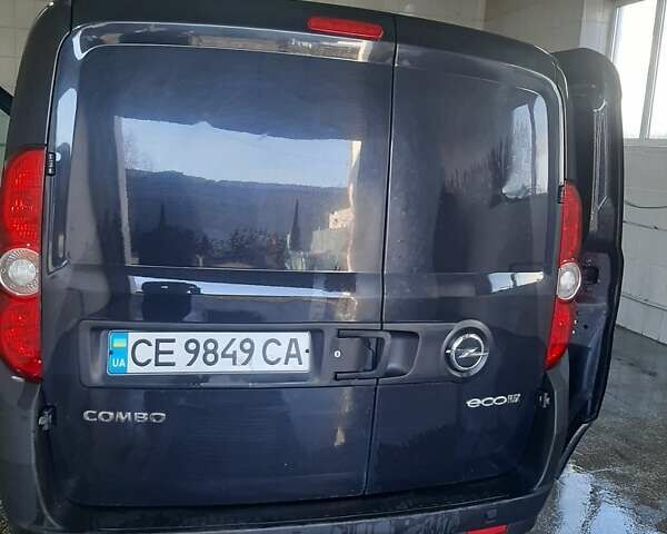 Черный Опель Комбо груз.-пасс., объемом двигателя 1.25 л и пробегом 316 тыс. км за 5000 $, фото 10 на Automoto.ua