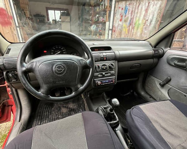 Красный Опель Комбо груз.-пасс., объемом двигателя 1.4 л и пробегом 438 тыс. км за 2000 $, фото 22 на Automoto.ua