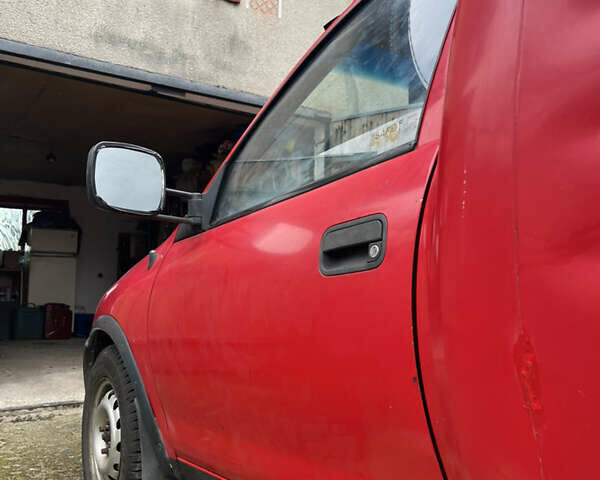 Красный Опель Комбо груз.-пасс., объемом двигателя 1.4 л и пробегом 438 тыс. км за 2000 $, фото 8 на Automoto.ua