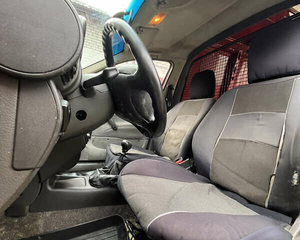 Красный Опель Комбо груз.-пасс., объемом двигателя 1.4 л и пробегом 438 тыс. км за 2000 $, фото 23 на Automoto.ua