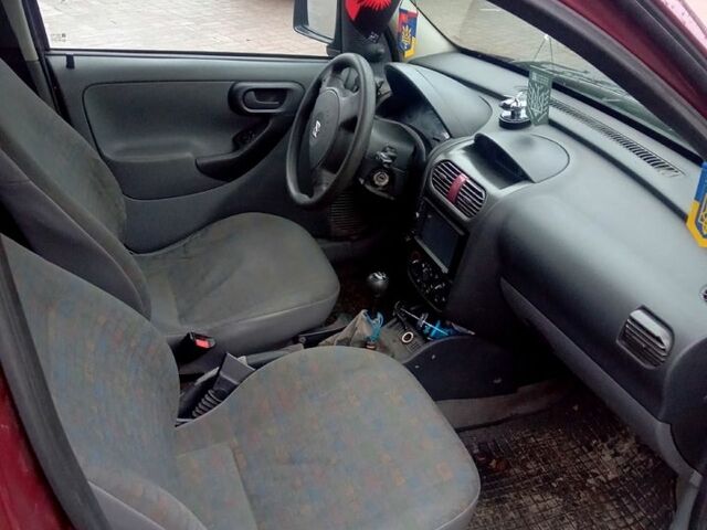 Красный Опель Комбо груз.-пасс., объемом двигателя 1.7 л и пробегом 350 тыс. км за 3000 $, фото 9 на Automoto.ua