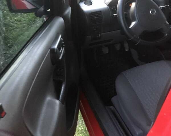 Красный Опель Комбо груз.-пасс., объемом двигателя 1.7 л и пробегом 280 тыс. км за 3000 $, фото 13 на Automoto.ua