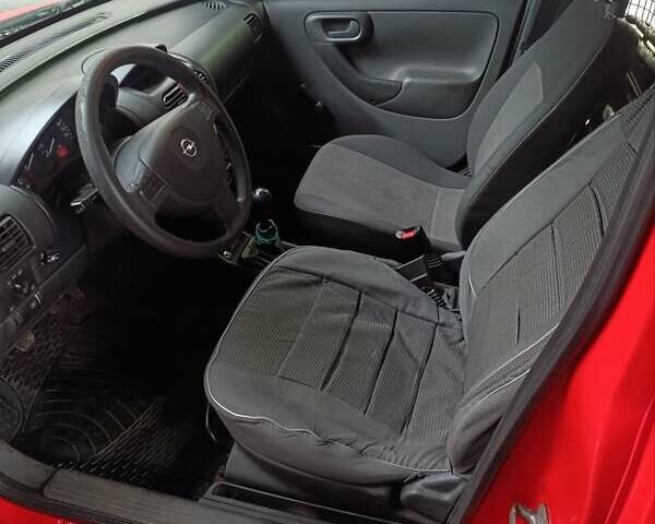 Красный Опель Комбо груз.-пасс., объемом двигателя 1.4 л и пробегом 220 тыс. км за 4200 $, фото 8 на Automoto.ua