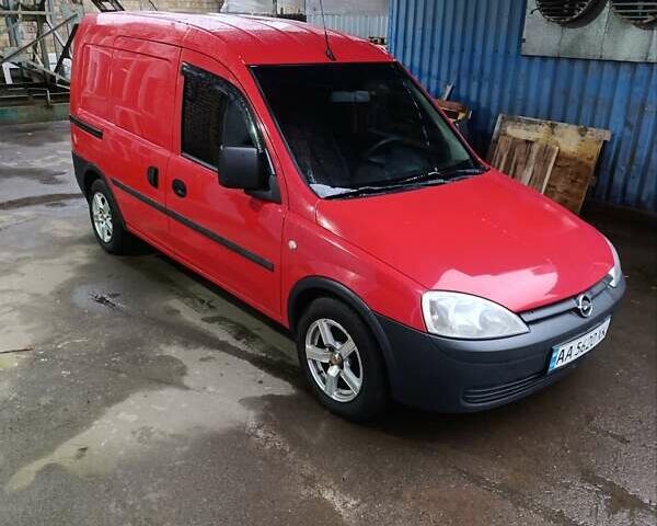 Красный Опель Комбо груз.-пасс., объемом двигателя 1.4 л и пробегом 220 тыс. км за 4200 $, фото 5 на Automoto.ua