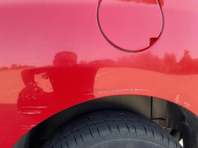 Червоний Опель Комбо вант.-пас., об'ємом двигуна 1.2 л та пробігом 246 тис. км за 5188 $, фото 15 на Automoto.ua