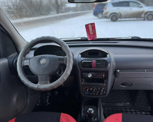 Красный Опель Комбо груз.-пасс., объемом двигателя 1.69 л и пробегом 222 тыс. км за 2900 $, фото 7 на Automoto.ua