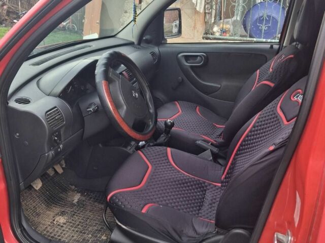 Красный Опель Комбо груз.-пасс., объемом двигателя 1.2 л и пробегом 7 тыс. км за 3000 $, фото 3 на Automoto.ua