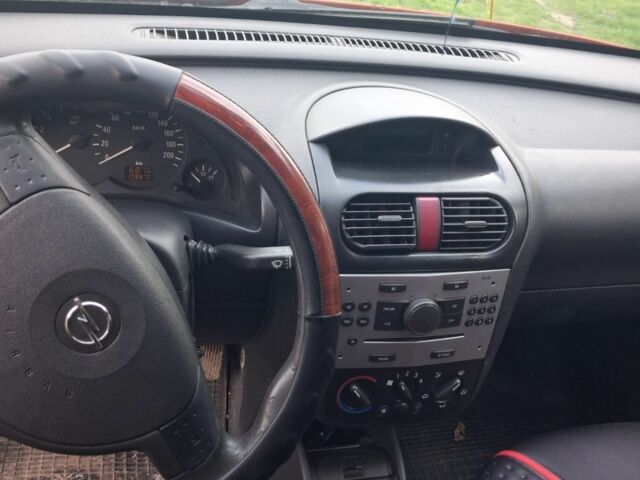 Красный Опель Комбо груз.-пасс., объемом двигателя 1.2 л и пробегом 7 тыс. км за 3000 $, фото 4 на Automoto.ua