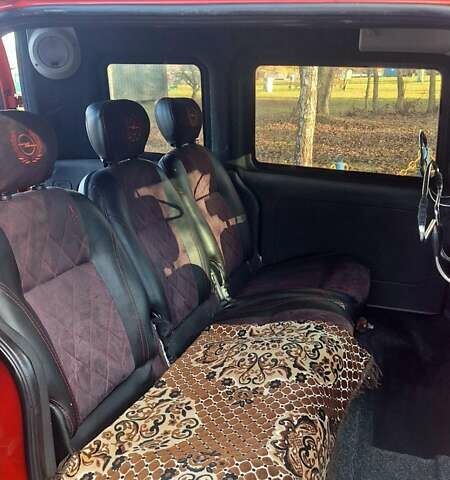 Красный Опель Комбо груз.-пасс., объемом двигателя 1.3 л и пробегом 246 тыс. км за 3699 $, фото 7 на Automoto.ua