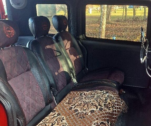 Красный Опель Комбо груз.-пасс., объемом двигателя 1.2 л и пробегом 246 тыс. км за 3699 $, фото 6 на Automoto.ua