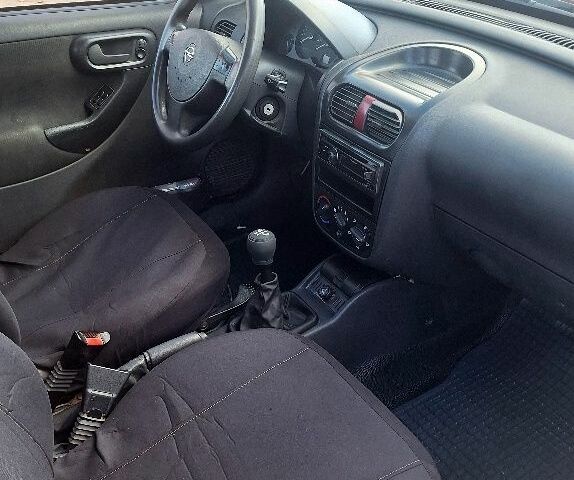 Красный Опель Комбо груз.-пасс., объемом двигателя 1.2 л и пробегом 246 тыс. км за 3699 $, фото 5 на Automoto.ua