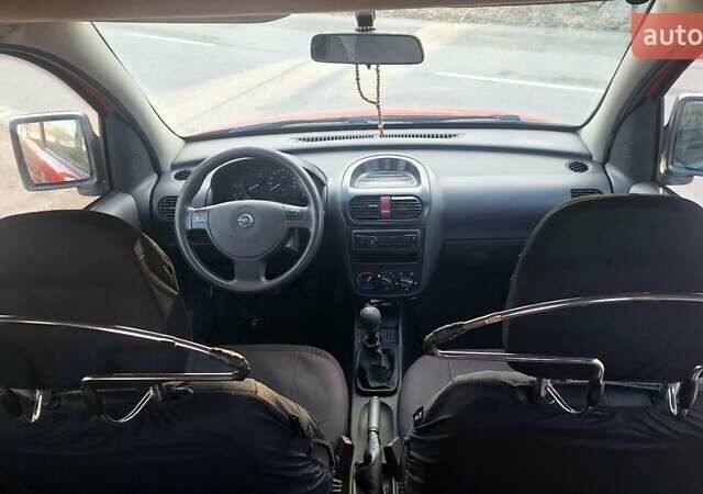Красный Опель Комбо груз.-пасс., объемом двигателя 1.3 л и пробегом 246 тыс. км за 3699 $, фото 6 на Automoto.ua