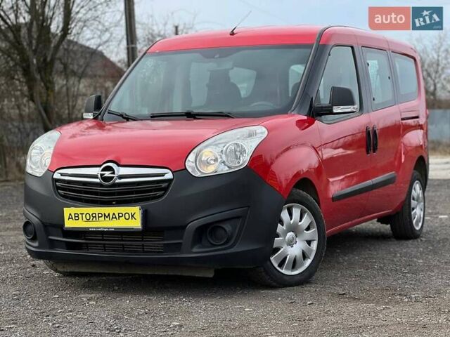Красный Опель Комбо груз.-пасс., объемом двигателя 1.6 л и пробегом 215 тыс. км за 12890 $, фото 1 на Automoto.ua
