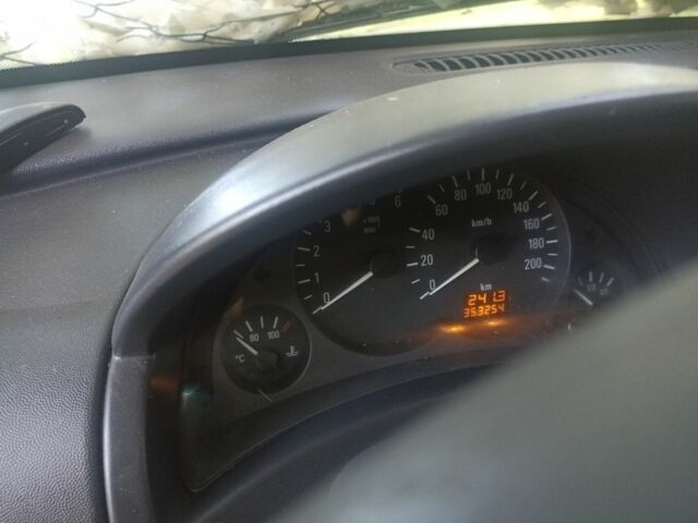 Серый Опель Комбо груз.-пасс., объемом двигателя 1.2 л и пробегом 354 тыс. км за 2500 $, фото 3 на Automoto.ua