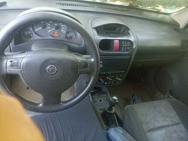 Серый Опель Комбо груз.-пасс., объемом двигателя 1.2 л и пробегом 354 тыс. км за 2500 $, фото 7 на Automoto.ua