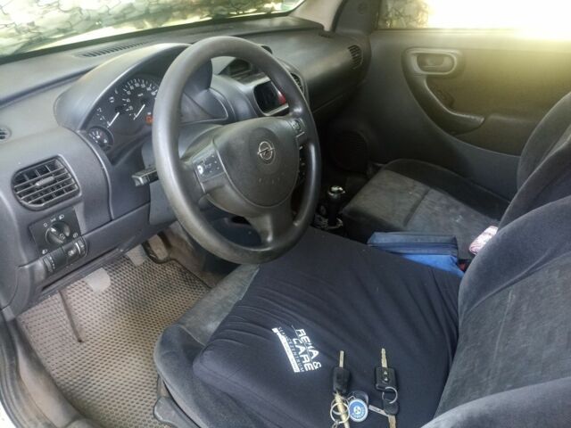 Серый Опель Комбо груз.-пасс., объемом двигателя 1.2 л и пробегом 354 тыс. км за 2500 $, фото 4 на Automoto.ua