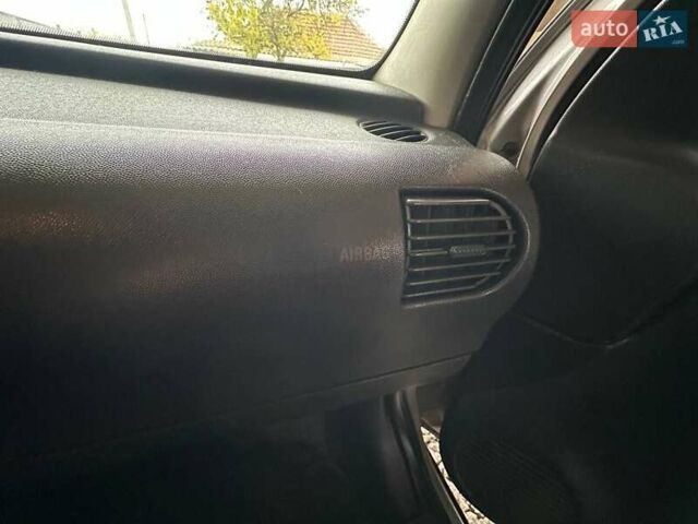 Серый Опель Комбо груз.-пасс., объемом двигателя 1.4 л и пробегом 188 тыс. км за 4999 $, фото 19 на Automoto.ua