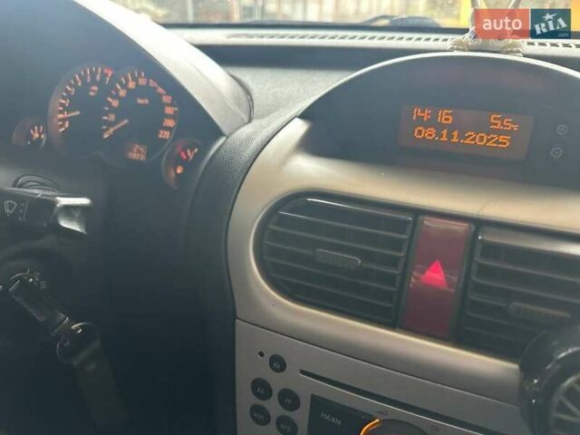 Серый Опель Комбо груз.-пасс., объемом двигателя 1.4 л и пробегом 188 тыс. км за 4999 $, фото 21 на Automoto.ua