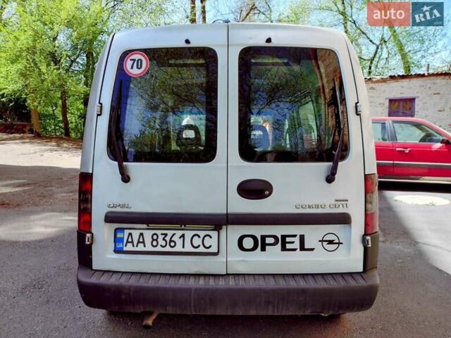 Серый Опель Комбо груз.-пасс., объемом двигателя 1.25 л и пробегом 300 тыс. км за 2800 $, фото 4 на Automoto.ua