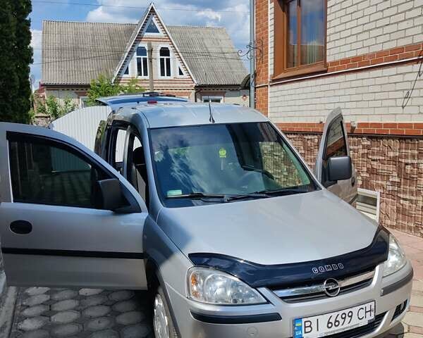 Серый Опель Комбо груз.-пасс., объемом двигателя 1.4 л и пробегом 145 тыс. км за 6200 $, фото 3 на Automoto.ua