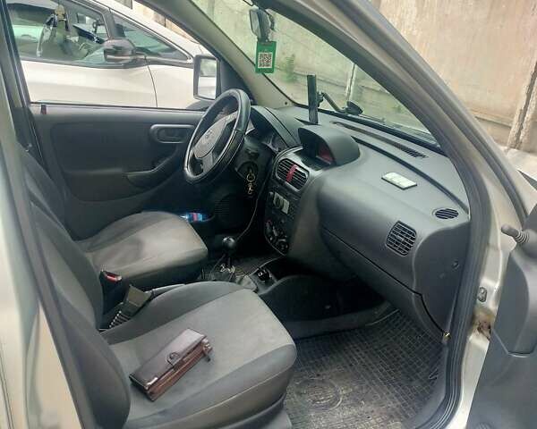 Серый Опель Комбо груз.-пасс., объемом двигателя 1.69 л и пробегом 100 тыс. км за 4000 $, фото 4 на Automoto.ua