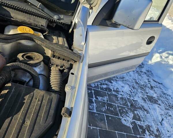 Серый Опель Комбо груз.-пасс., объемом двигателя 1.25 л и пробегом 229 тыс. км за 5400 $, фото 14 на Automoto.ua