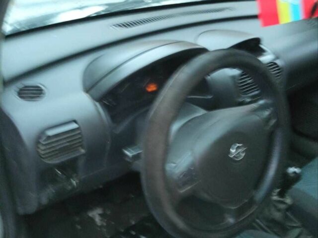 Серый Опель Комбо груз.-пасс., объемом двигателя 1.3 л и пробегом 200 тыс. км за 2800 $, фото 12 на Automoto.ua