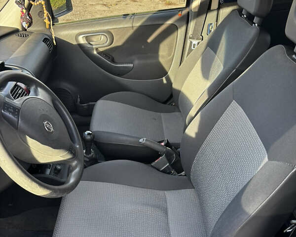 Синій Опель Комбо вант.-пас., об'ємом двигуна 1.25 л та пробігом 210 тис. км за 4100 $, фото 5 на Automoto.ua