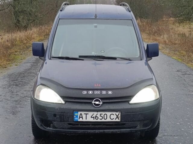 Синий Опель Комбо груз.-пасс., объемом двигателя 1.7 л и пробегом 335 тыс. км за 2200 $, фото 1 на Automoto.ua