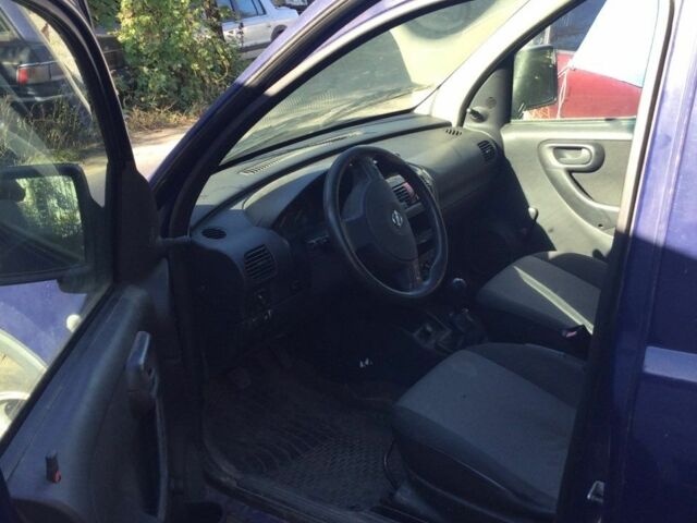 Синий Опель Комбо груз.-пасс., объемом двигателя 1.4 л и пробегом 220 тыс. км за 3400 $, фото 3 на Automoto.ua