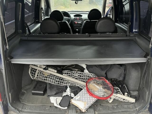 Синий Опель Комбо груз.-пасс., объемом двигателя 1.3 л и пробегом 300 тыс. км за 3750 $, фото 7 на Automoto.ua