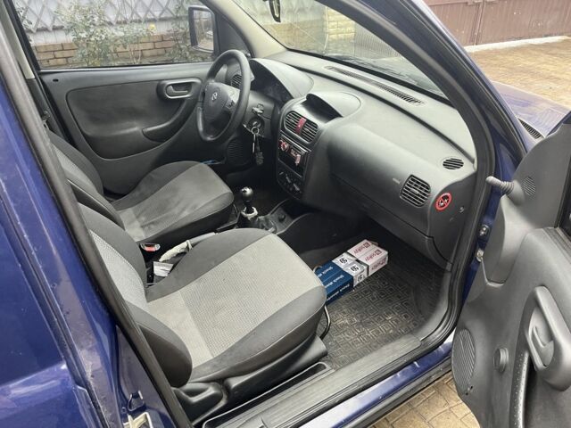 Синий Опель Комбо груз.-пасс., объемом двигателя 1.3 л и пробегом 300 тыс. км за 3750 $, фото 3 на Automoto.ua