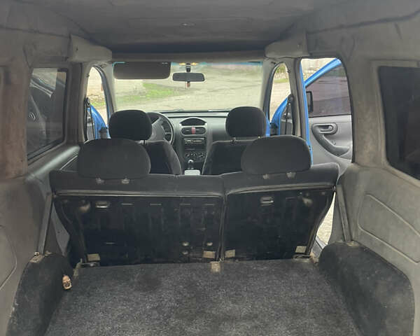 Синий Опель Комбо груз.-пасс., объемом двигателя 1.69 л и пробегом 417 тыс. км за 2700 $, фото 2 на Automoto.ua