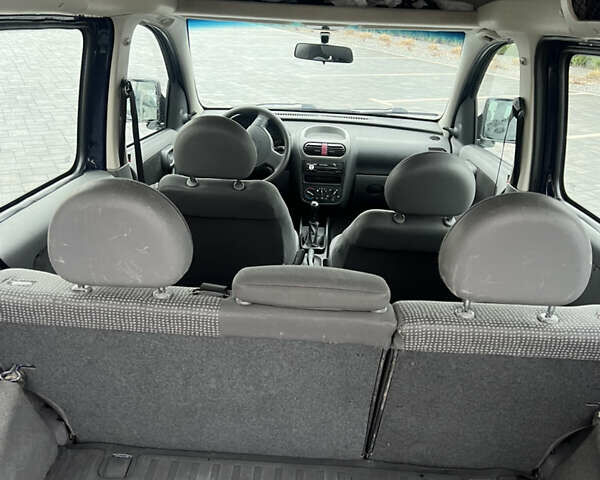 Синий Опель Комбо груз.-пасс., объемом двигателя 1.6 л и пробегом 277 тыс. км за 2890 $, фото 9 на Automoto.ua