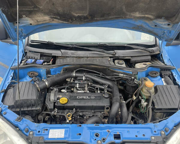 Синий Опель Комбо груз.-пасс., объемом двигателя 1.69 л и пробегом 417 тыс. км за 2700 $, фото 12 на Automoto.ua