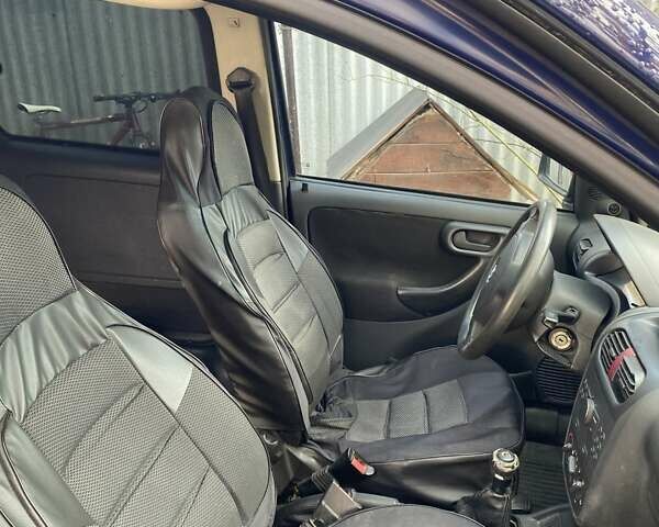 Синій Опель Комбо вант.-пас., об'ємом двигуна 1.25 л та пробігом 241 тис. км за 4300 $, фото 12 на Automoto.ua