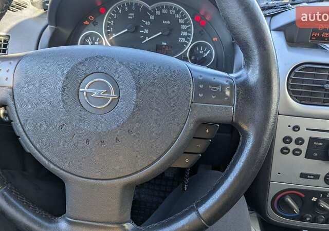 Синий Опель Комбо груз.-пасс., объемом двигателя 1.6 л и пробегом 283 тыс. км за 3650 $, фото 8 на Automoto.ua