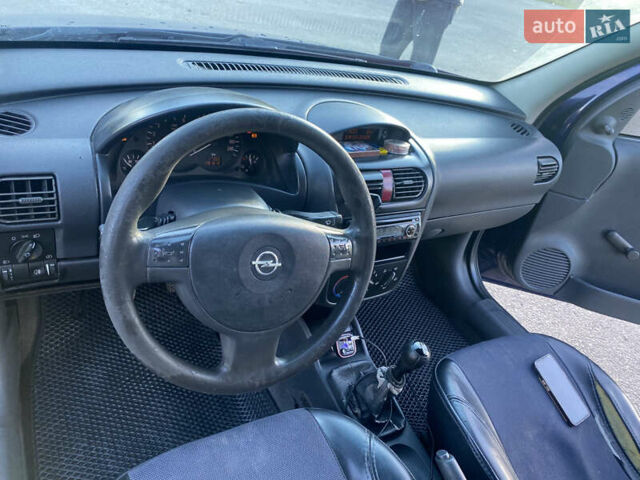 Синий Опель Комбо груз.-пасс., объемом двигателя 1.3 л и пробегом 390 тыс. км за 1900 $, фото 7 на Automoto.ua
